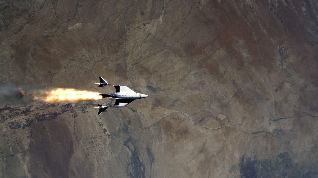VSS Unity starts its engines after release from its mothership,