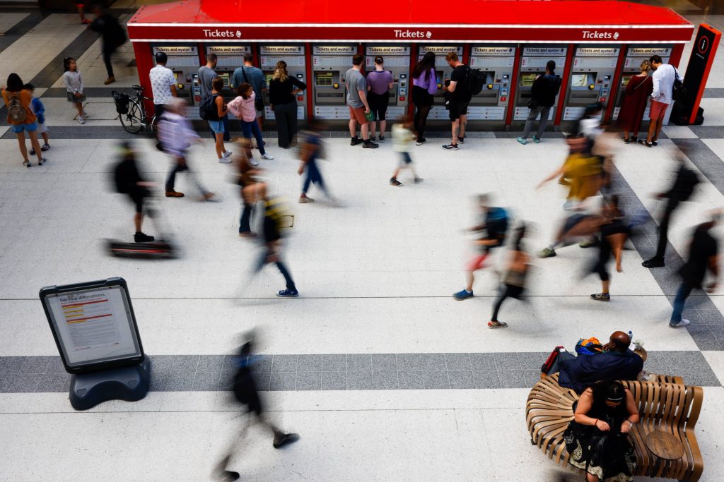 Commuters pass through the concourse at London Liverpool Street railway station during a one-day strike by tube workers in London, UK, on Friday, Aug. 19, 2022. London's subway network largely ground to a halt on Friday as workers went on strike, bringing more disruption to Britains embattled transport system. Photographer: Carlos Jasso/Bloomberg via Getty Images