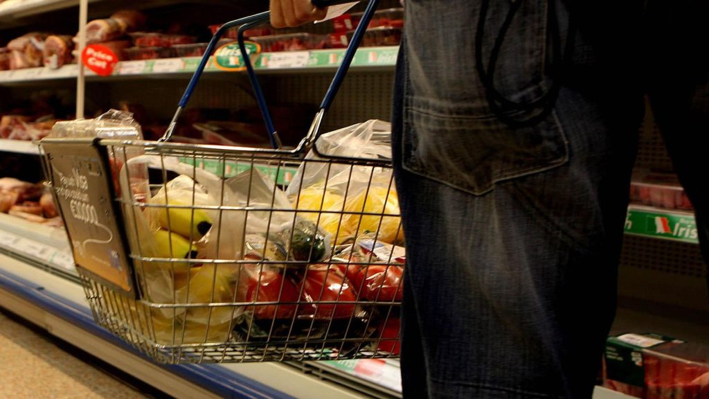 Undated file photo of a man holding a shopping basket in a supermarket. Shoppers have witnessed an 11.6% surge in grocery prices for the past month, the highest level since 2008, according to new figures. Research firm Kantar has said this equates to a £533 annual increase in the average household's grocery bill. Issue date: Tuesday August 16, 2022